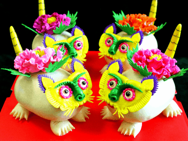 1706512768880234.gif 動圖:黃陵手藝人制作的“靈獅猛虎”和“二龍戲珠面花 孟軍攝.gif